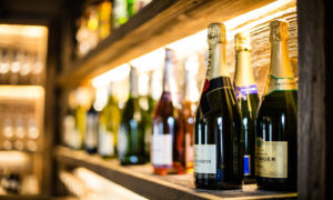 Champagne bottles in private bar area at Montfort Lodge, St Anton for private après ski